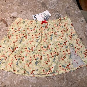 Dippin' Daisy's Yellow Floral Mini Skirt from Urban Outfitters
